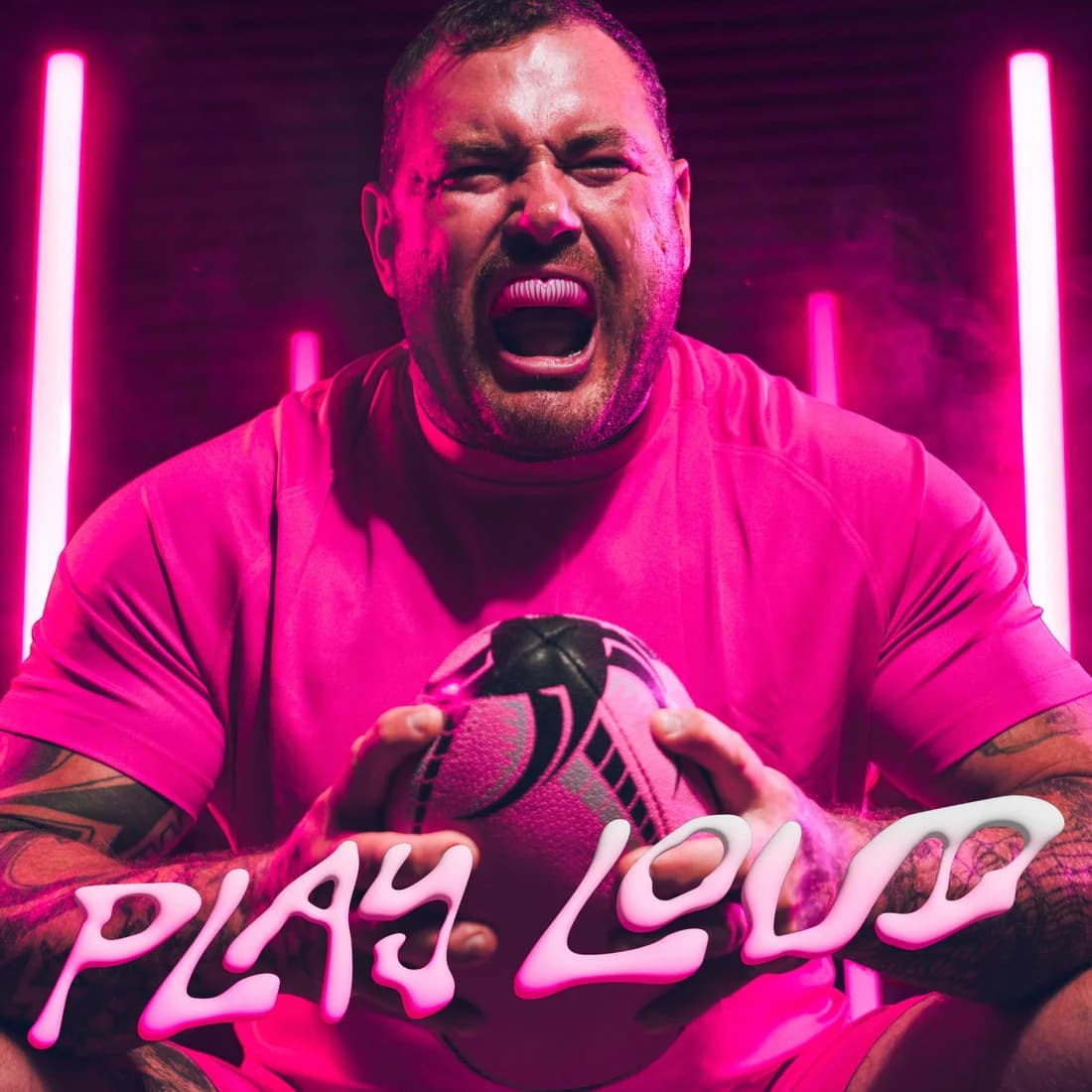 SafeJawz Play Loud campaign: athlete wearing Pink Viper with a rugby ball