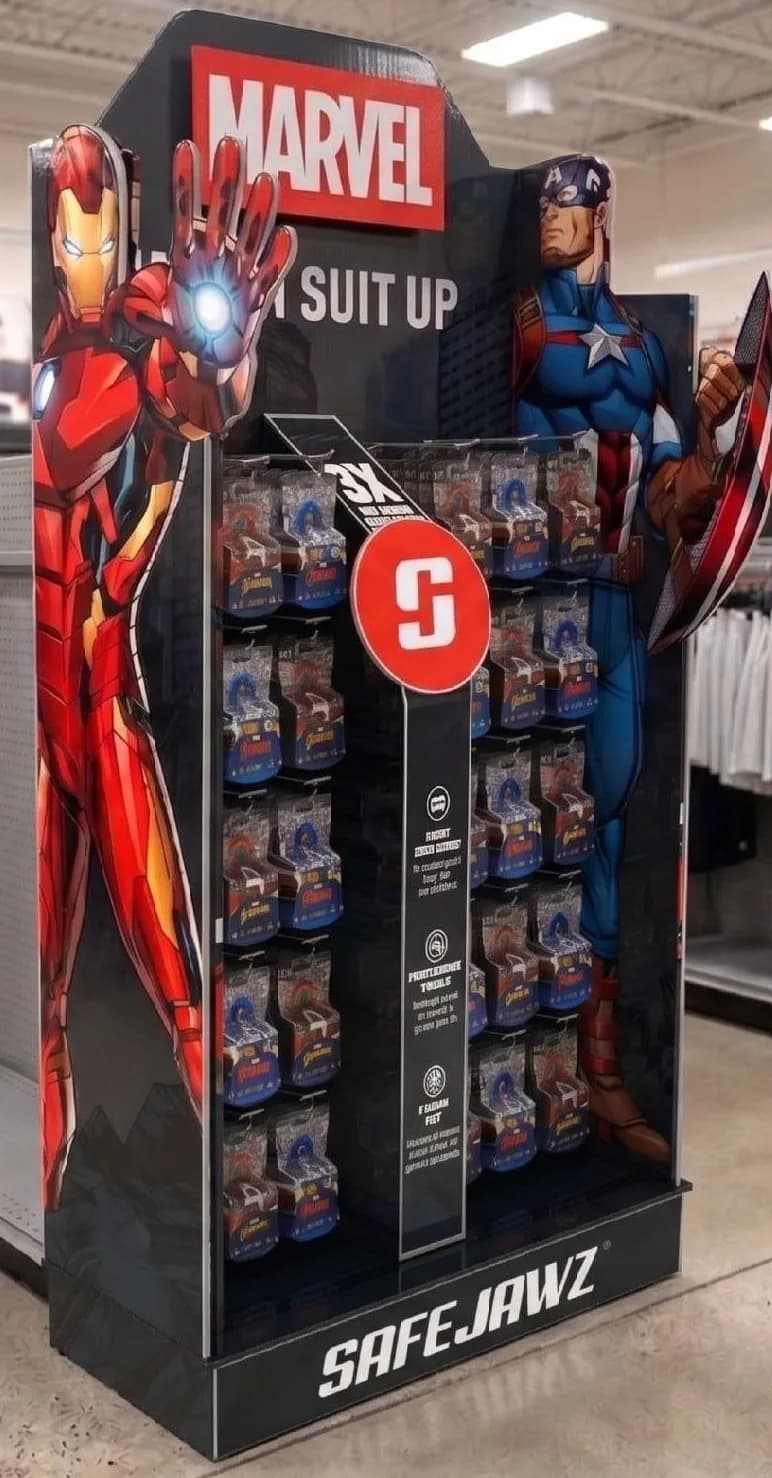 SafeJawz Marvel floor display with Iron Man and Captain America, shown in a shop. Original SafeJawz photograph.